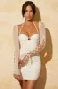 Lace Up Sleeve Mini Dress in White sold by Oh Polly