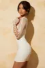 Lace Up Sleeve Mini Dress in White sold by Oh Polly
