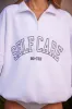 Oversized Half Zip Sweatshirt in White sold by Oh Polly