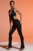 Petite Plunge Neck Cut Out Jumpsuit in Black sold by Oh Polly