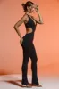 Petite Plunge Neck Cut Out Jumpsuit in Black sold by Oh Polly