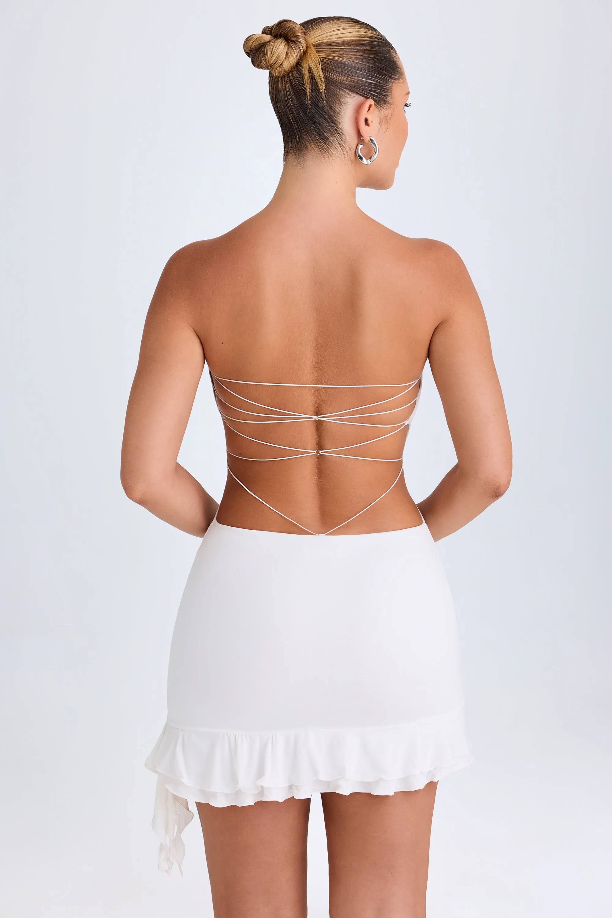 Ruffle-Trim Cut-Out Bandeau Mini Dress in White sold by Oh Polly product image thumbnail 2