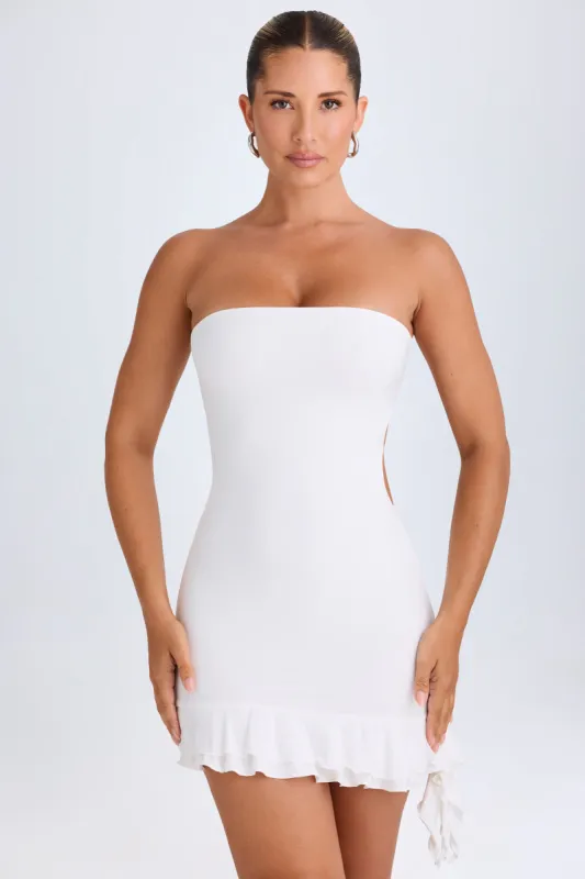 Ruffle-Trim Cut-Out Bandeau Mini Dress in White sold by Oh Polly