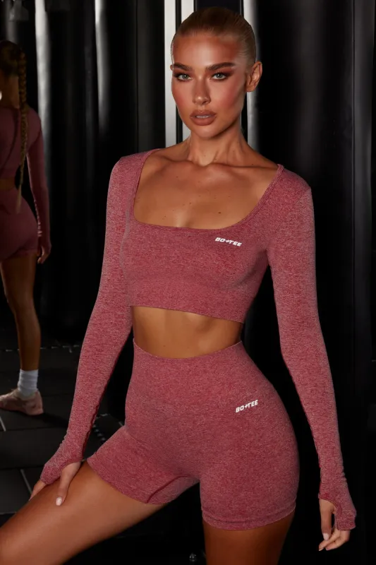 Motion Seamless Long Sleeve Crop Top in Red sold by Oh Polly