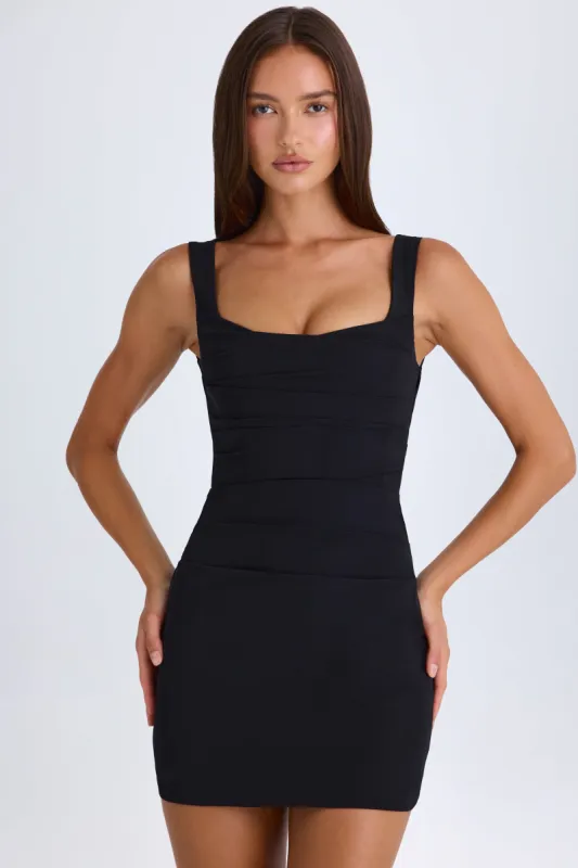 Draped Corset Mini Dress in Black sold by Oh Polly
