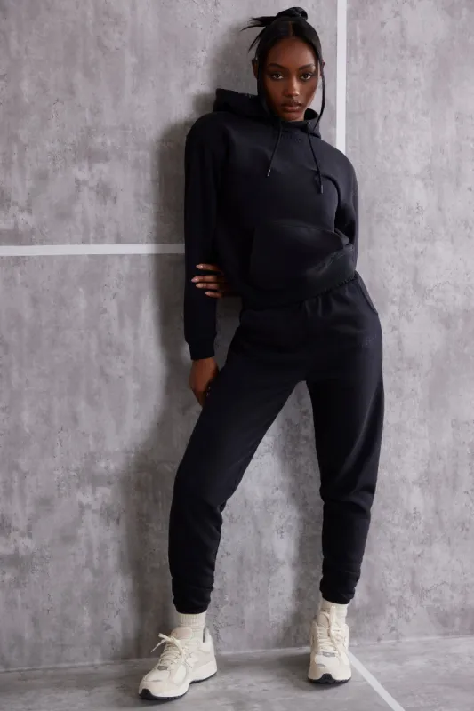 Petite High Waist Cuffed Joggers in Washed Black sold by Oh Polly