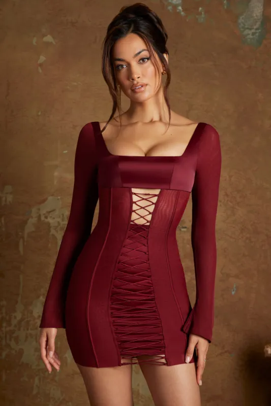 Long Sleeve Lace Up Corset Micro Mini Dress in Wine sold by Oh Polly