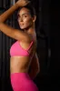 Super Sculpt Seamless Open Back Sports Bra in Fuchsia sold by Oh Polly