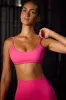 Super Sculpt Seamless Open Back Sports Bra in Fuchsia sold by Oh Polly