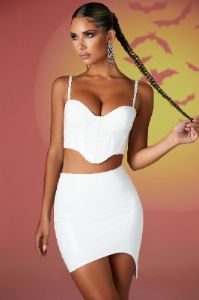 Vinyl Curved Hem Mini Skirt in White sold by Oh Polly