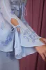 Long Sleeve Tie Front Top in Blue sold by Oh Polly