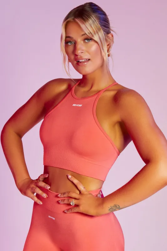 Incline Seamless High Neck Crop Top in Coral sold by Oh Polly
