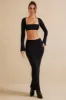 Long Sleeve Crop Top in Black sold by Oh Polly