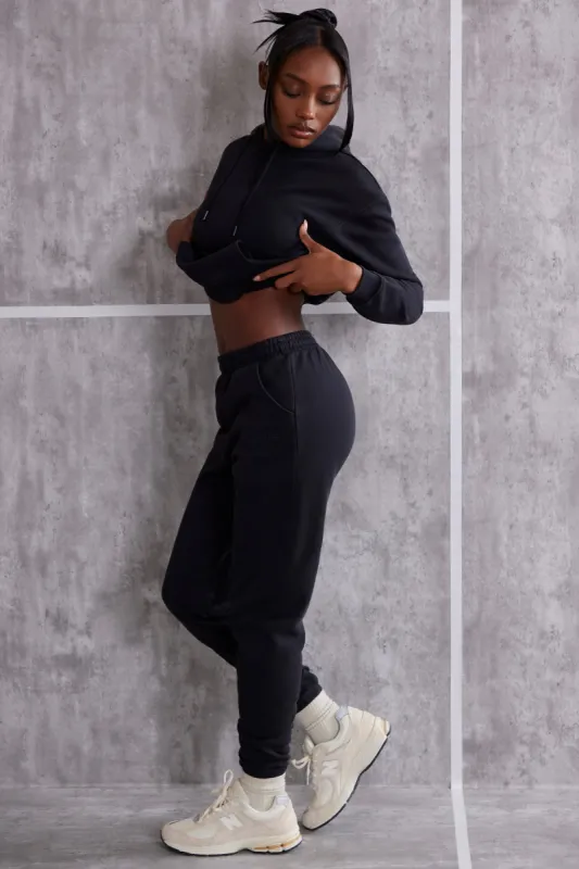 High Waist Cuffed Joggers in Washed Black sold by Oh Polly