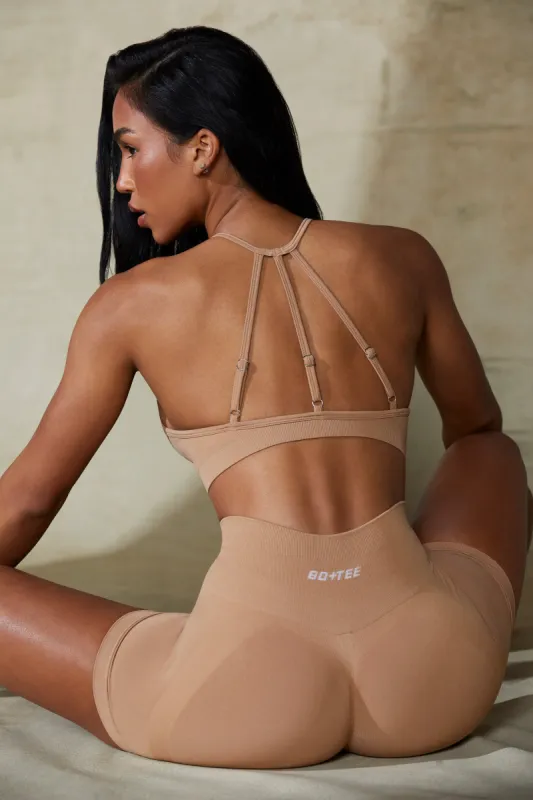 High Neck Open Back Define Luxe Sports Bra in Warm Taupe sold by Oh Polly