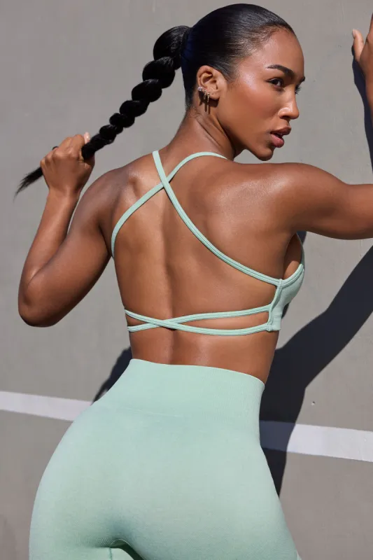 Super Sculpt Seamless Open Back Sports Bra in Pistachio sold by Oh Polly