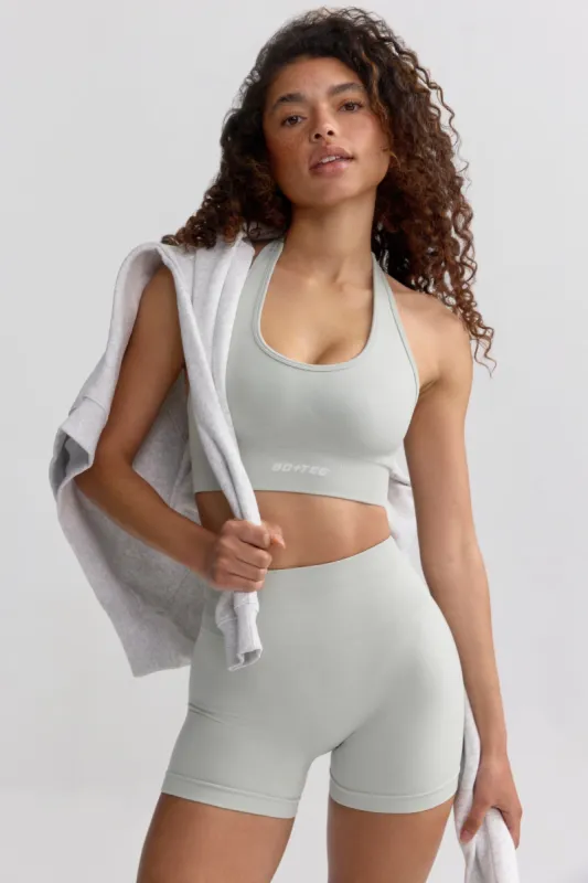 Define Luxe Cross-Back Sports Bra in Fog sold by Oh Polly