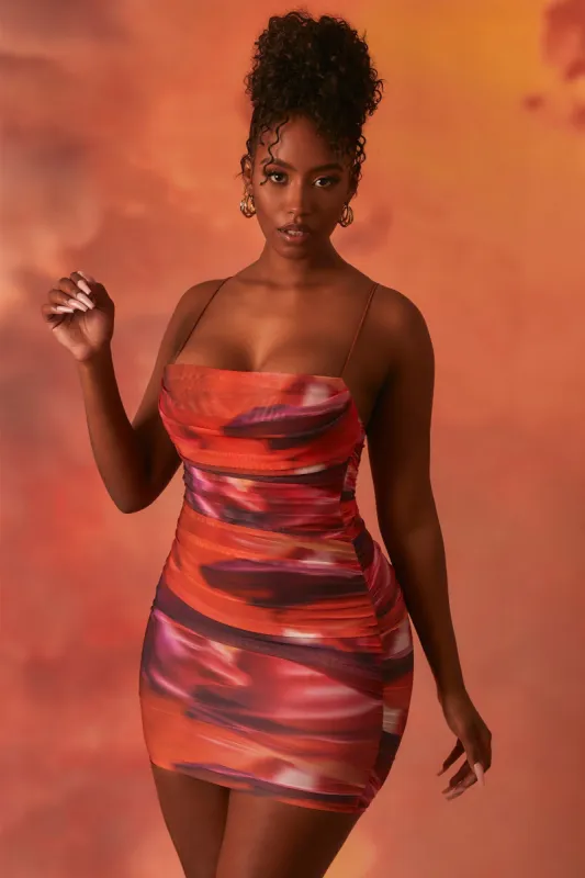 Lunar Sleeveless Bodycon Ruched Mesh Mini Dress in Orange sold by Oh Polly