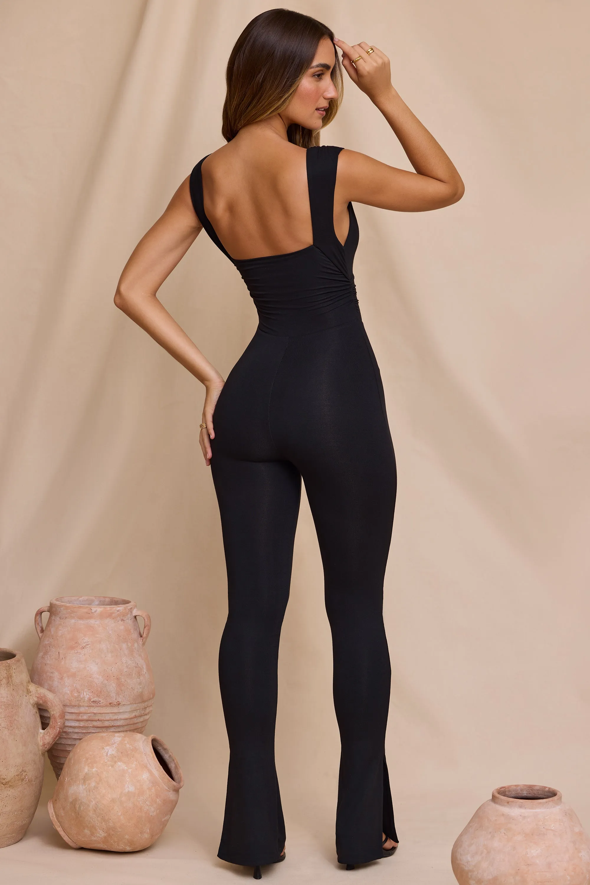 Plunge Neck Ruched Waist Jumpsuit in Black sold by Oh Polly product image thumbnail 2