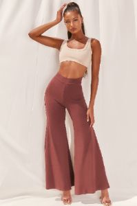 Cutting A Fine Figure Flared Trousers in Chocolate Brown sold by Oh Polly