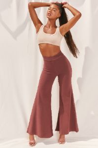 Cutting A Fine Figure Flared Trousers in Chocolate Brown sold by Oh Polly