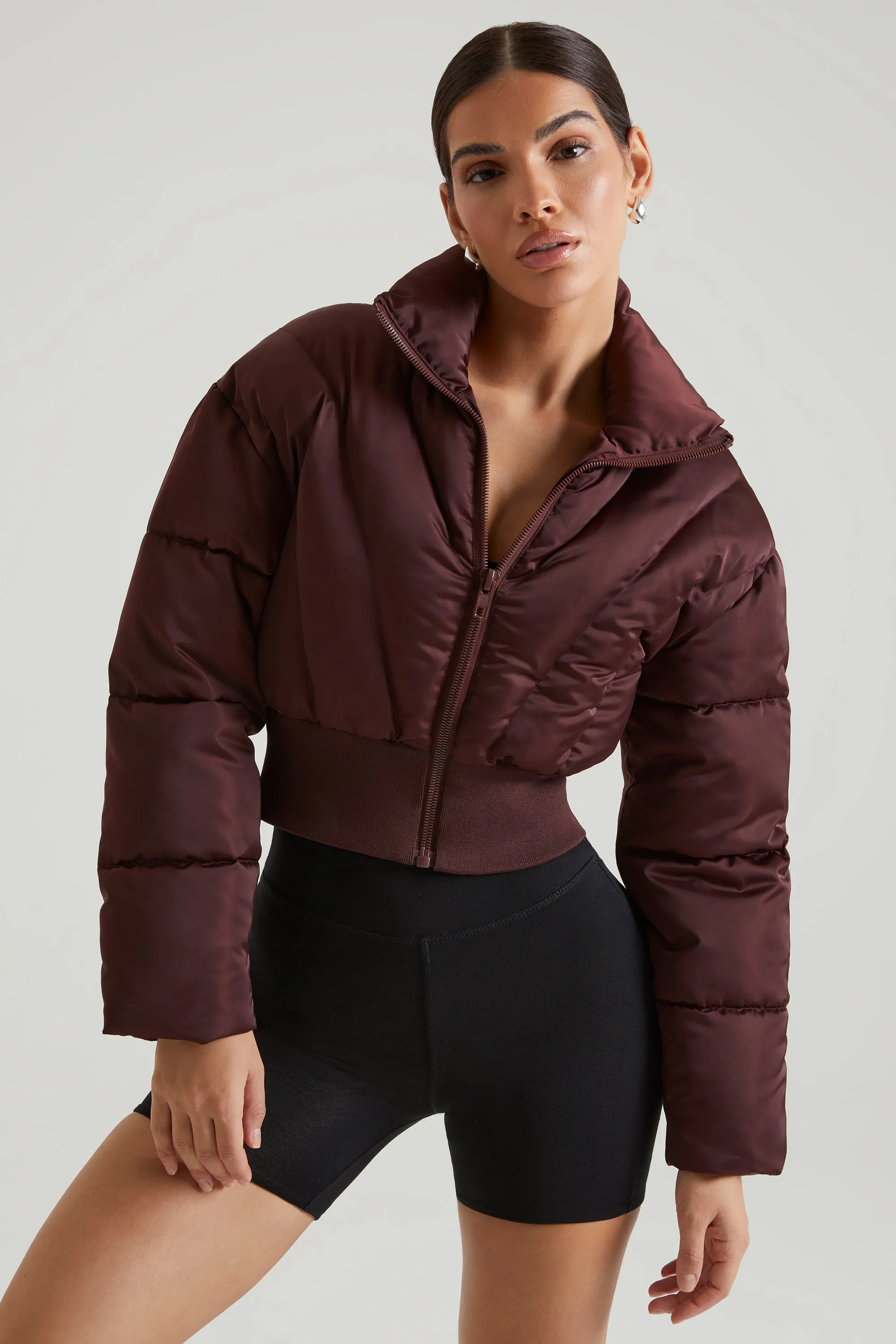 Ribbed Puffer Jacket in Brown sold by Oh Polly