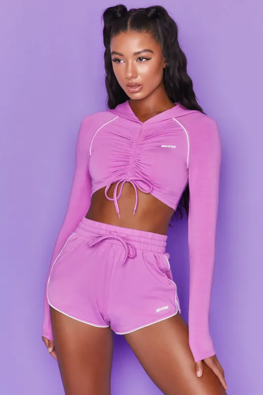 New Goals Cropped Ruched Hoodie in Purple made by Oh Polly