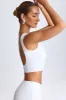 Draped Open-Back Tank Top in White sold by Oh Polly