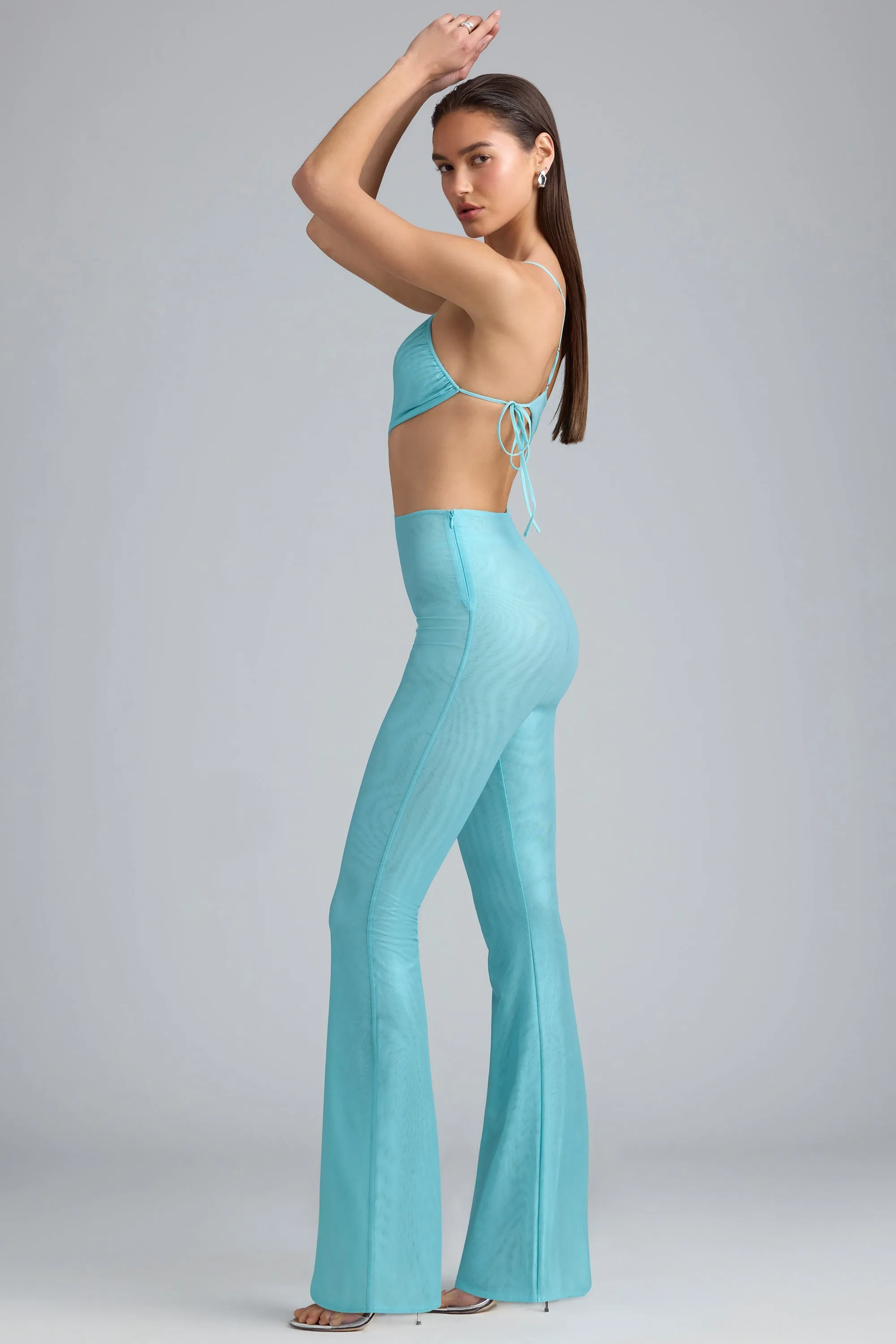Tall Metallic Ruched Cut-Out Flared Jumpsuit in Ice Blue sold by Oh Polly product image thumbnail 3