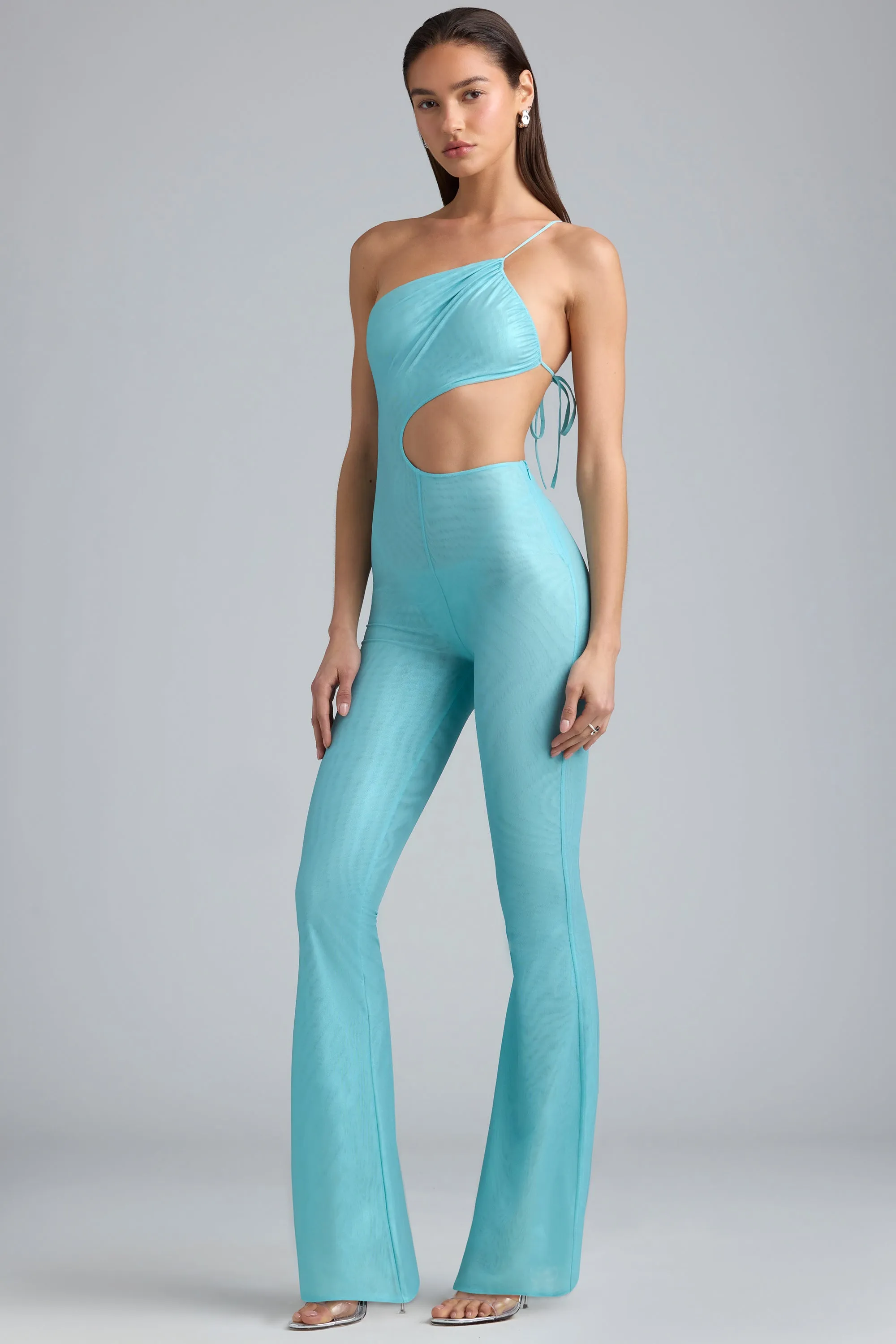 Tall Metallic Ruched Cut-Out Flared Jumpsuit in Ice Blue sold by Oh Polly