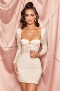 Extraordinary Satin Lace Up Puff Sleeve Mini Dress in Cream sold by Oh Polly