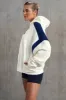 Oversized Hooded Sweatshirt in White sold by Oh Polly