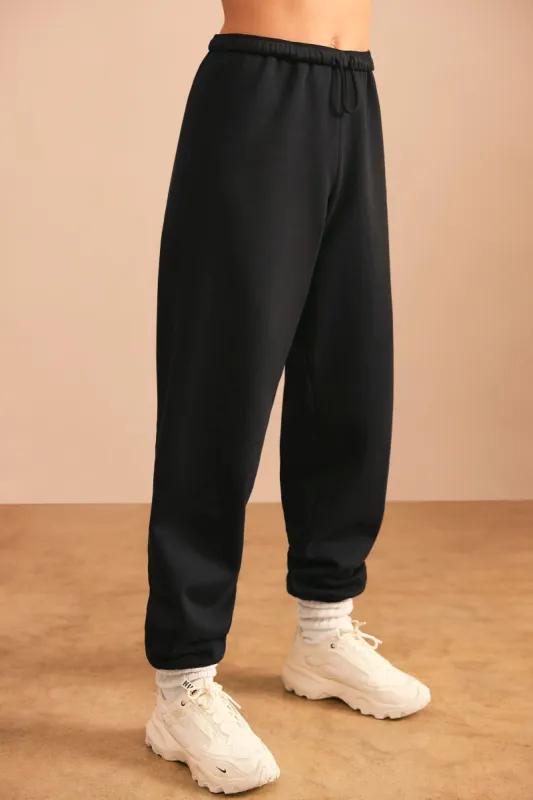 Petite Relaxed Fit Joggers in Black sold by Oh Polly