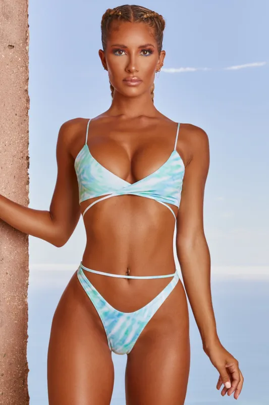 Cut Out Thong Bikini Bottoms in Blue Tie Dye sold by Oh Polly