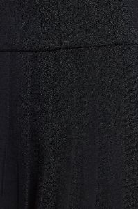 Woven Wool Drop Waist Kilt Mini Dress in Black sold by Oh Polly