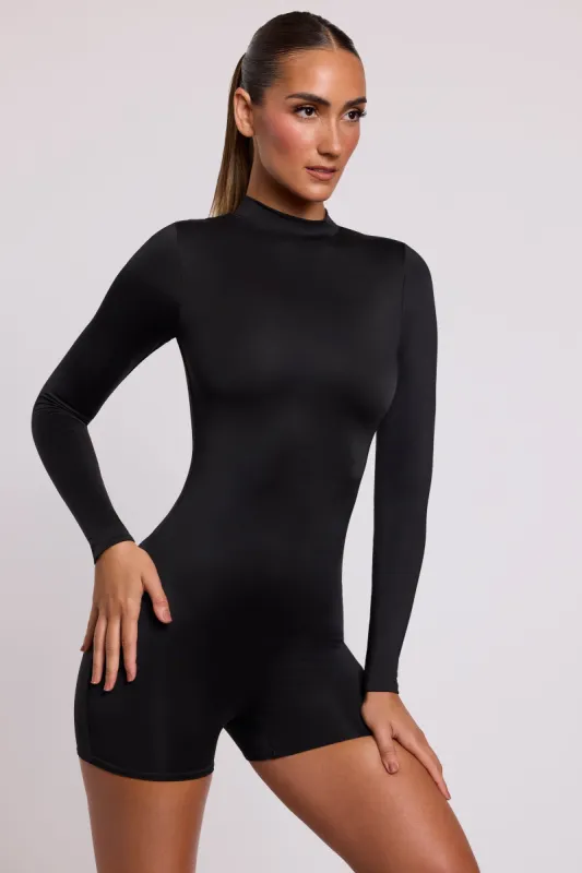 High Neck Long Sleeve Romper in Black sold by Oh Polly