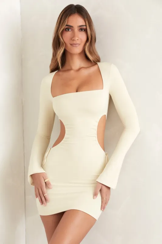 Long Sleeve Cut Out Mini Dress in Ivory sold by Oh Polly