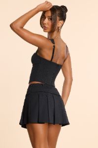 Woven Wool Mid Rise Pleated Micro Mini Skirt in Black sold by Oh Polly