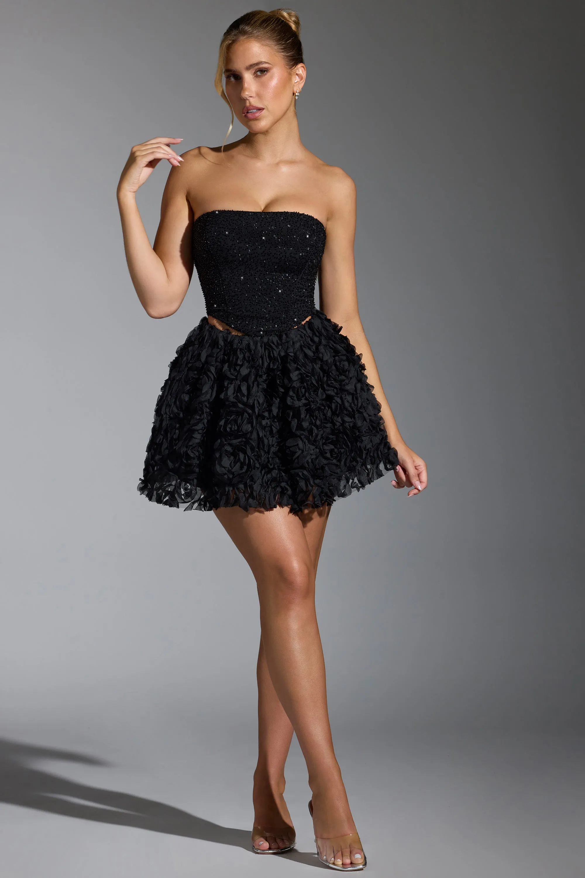 Floral-Appliqué Mini Skirt in Black sold by Oh Polly