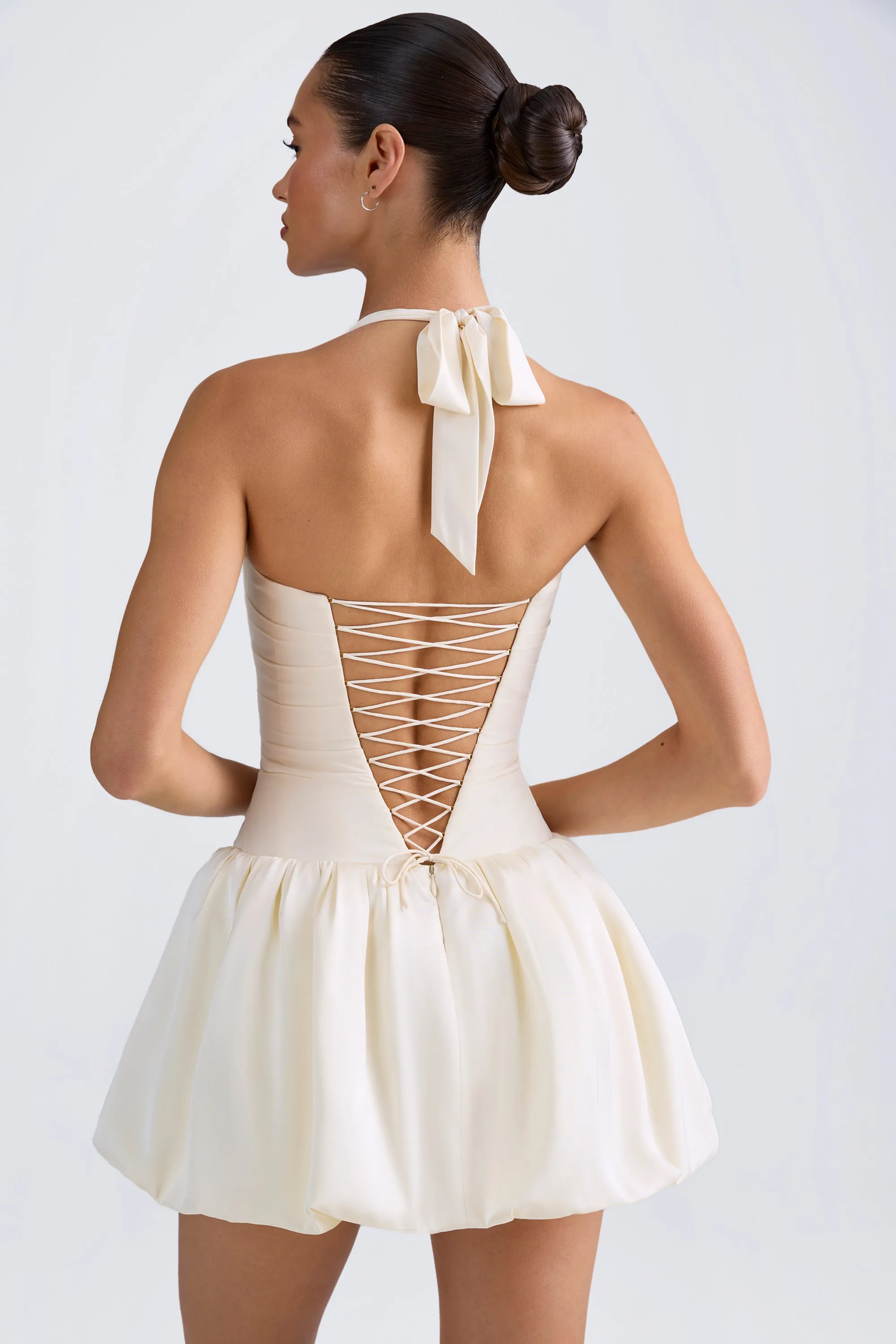 Halterneck Lace-Up Bubble Hem Corset Micro Mini Dress in Ivory sold by Oh Polly product image thumbnail 2