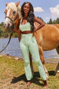 Petite Cosy Flared Leg Trousers in Green sold by Oh Polly
