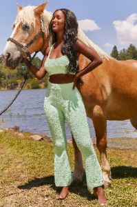 Petite Cosy Flared Leg Trousers in Green sold by Oh Polly