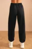 Relaxed Fit Joggers in Black sold by Oh Polly