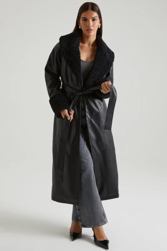 Tie Up Coat with Shearling Collar and Cuffs in Black sold by Oh Polly