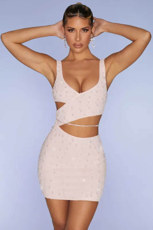 Embellished Cut Out Mini Dress in Blush sold by Oh Polly