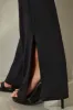 Tall Long Sleeve Open Back Jumpsuit in Black sold by Oh Polly