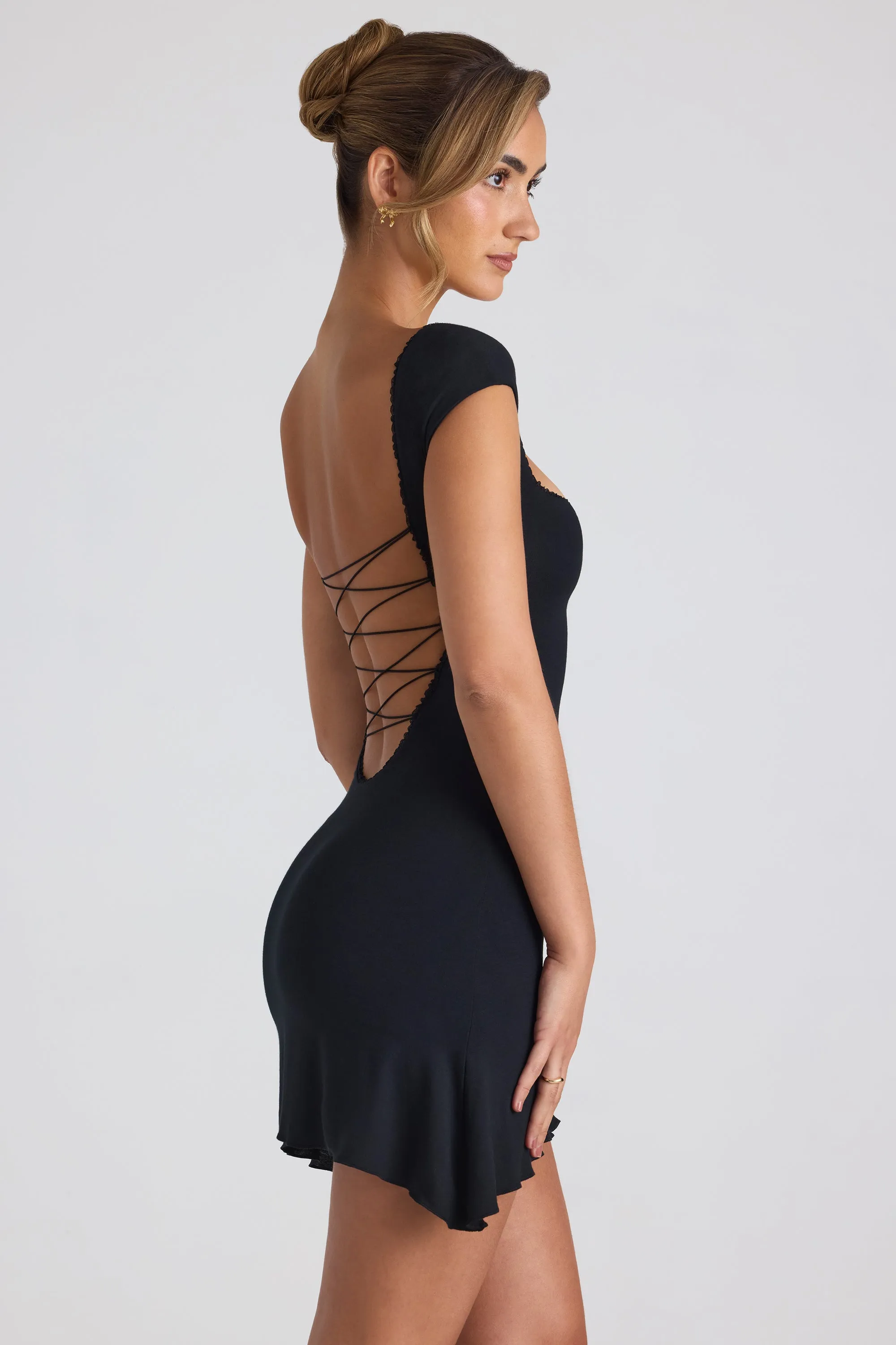 Modal Asymmetric Lace-Up A-Line Mini Dress in Black sold by Oh Polly product image thumbnail 3