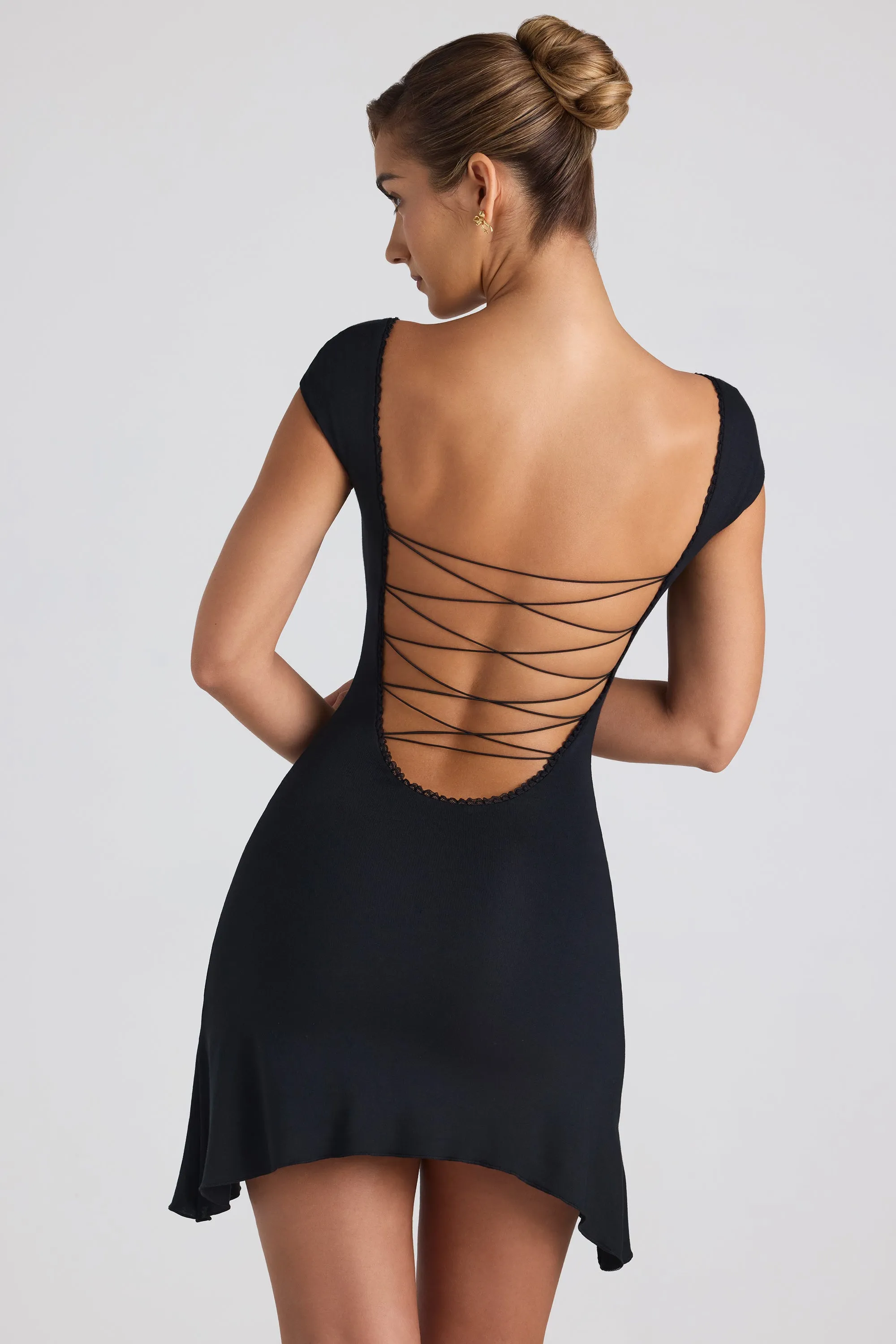Modal Asymmetric Lace-Up A-Line Mini Dress in Black sold by Oh Polly product image thumbnail 2
