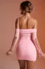 Lace Up Long Sleeve Corset Mini Dress in Pink sold by Oh Polly