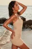 Beaded Crochet Mini Dress in Beige sold by Oh Polly
